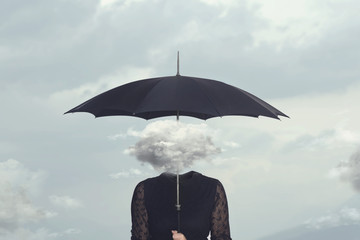 elegant woman with cloud head sheltering herself from the rain with umbrella © Cristina Conti