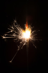 Sparks of Bengal fire on a black background