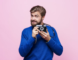 Fototapeta premium Portrait of man holding camera