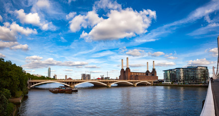 Abandonded Battersea Power Station and Grosvenor Bridge over the River Thames in South West London England in 2013