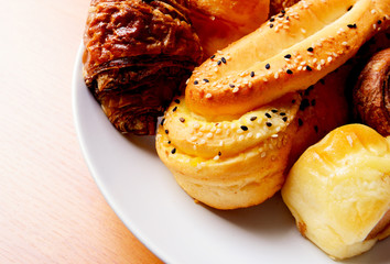 Bakery foodstuffs on wood board