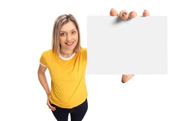 Woman showing a blank card