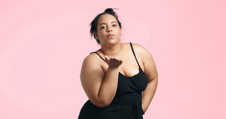 Obraz premium Plus size model in studio shoot happy smiling