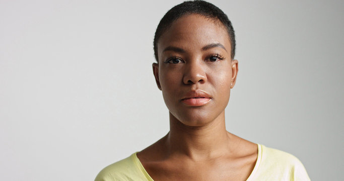 pretty mixed race woman with short hair in studio shoot
