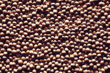 Dark abstract texture or background made of styrofoam balls.