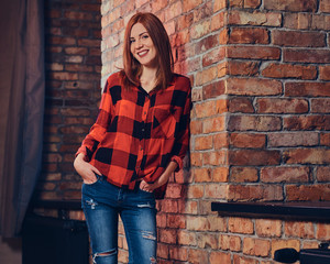 Redhead female in fleece shirt.