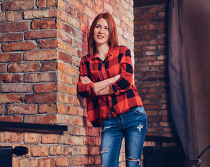 Redhead female in fleece shirt.