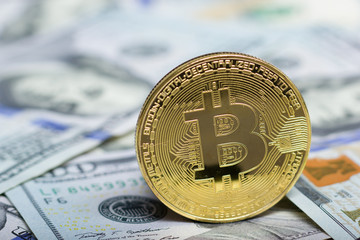 Bitcoin golden coin New virtual money and dollar background . Cryptocurrency. Business and Trading concept. Close-up shot