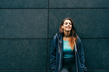 young woman mixed race outdoors posing looking sideway