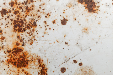 Bright rust stains texture paint showing through to rust