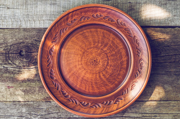 Clay dish on a wooden table