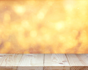 Naklejka na ściany i meble Empty countertop on blurred Golden background.