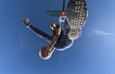 Man scoring street ball goal