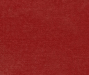 Red color artificial leather surface.