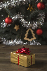 Fototapeta na wymiar christmas gifts under christmas tree