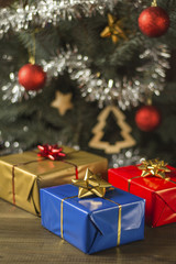 Obraz na płótnie Canvas christmas gifts under christmas tree