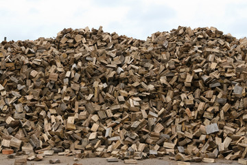 Chopped wood logs lying in a heap