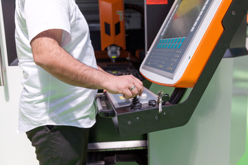 Man working at programmable machine © wellphoto