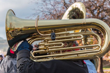 Man Playing Brass Trumpet in Band in Outdoor Event