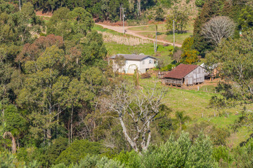 Fototapeta na wymiar Farm, Forest and mountains in Gramado