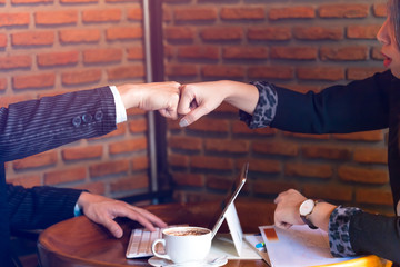 Business Partners Trust in Team Giving Fist Bump to Greeting Start up Team project,Business people Teamwork are Partnership in the Office Team Meeting together.