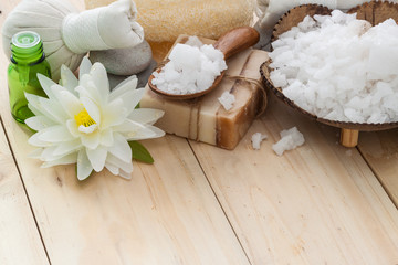 Salt spa and massage  objects over wooden background, wellness and relaxation concept