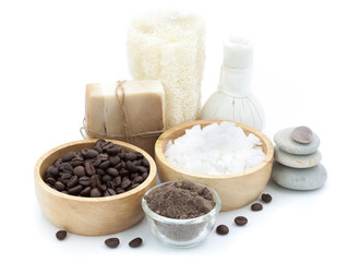 Fototapeta na wymiar Coffee powder and salt scrub, spa and massage objects isolated on white, wellness and relaxation concept, selective focus
