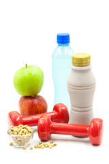 Dumbbells, apple and protein source consisting of whey milk and soybeans isolated on white, fitness and exercise concept