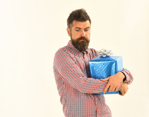 Macho with wrapped blue gift and white bow