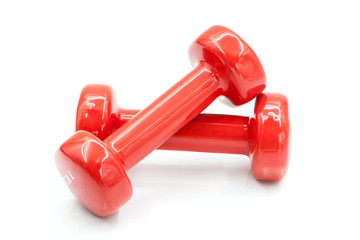 Red color dumbbells isolated on white, firness and exercise concept