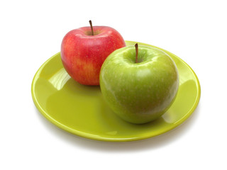 Two apples on green plate, healthy food