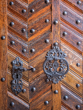 Medieval wooden door of the cathedral in Prague Castle