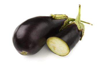 Ripe fresh eggplants isolated on white background