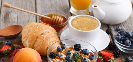 Fresh crusty croissants and muesli for morning meals