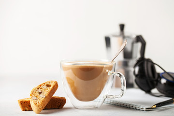 Coffee of a cappuccino, biscotti