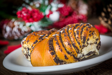 Sweet buns with poppy seed and frosting.