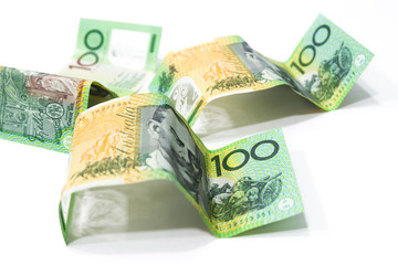 One hundred Australian dollar banknotes isolated on white background.