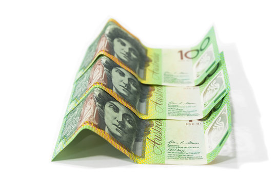 One hundred Australian dollar banknotes isolated on white background.