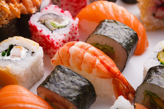 Set of sushi, maki and rolls background
