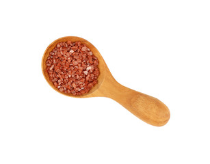 Close up wooden spoon of red Hawaiian salt