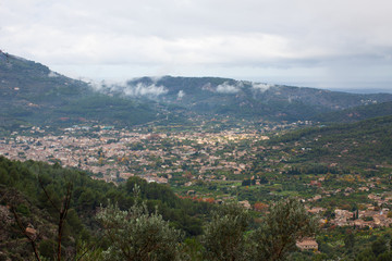 Fototapeta na wymiar Aerial view of Biniaraix, a small village in Soller Valley surrounded by the Serra de Tramuntana mountains. Majorca, Spain