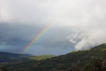 Rainbow over Soller Valley surrounded by the Serra de Tramuntana mountains. Majorca, Spain