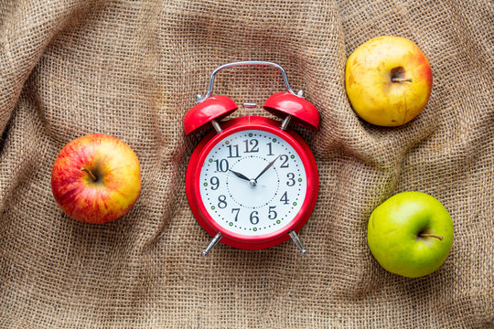Apples and alarm clock