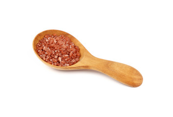 Close up wooden spoon of red Hawaiian salt