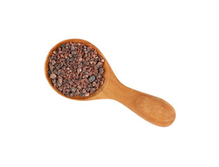 Close up wooden spoon of Indian brown salt
