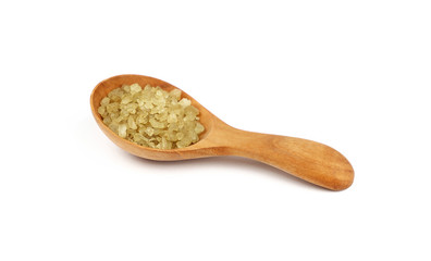 Close up wooden spoon of green Hawaiian salt