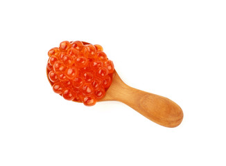 Wooden spoon of red salmon caviar close up