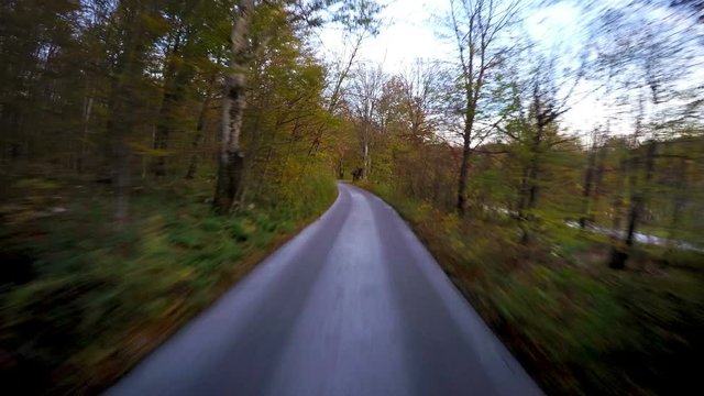 Plitvice Lakes National Park in the autumn. Tourist bus windscreen time lapse footage.