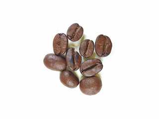 A group of coffee beans on white background