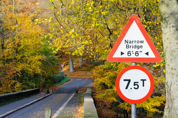 Narrow bridge road sign, with 7.5 ton/tonne limit.  Autumn colours